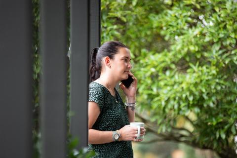 Person outside taking phone call